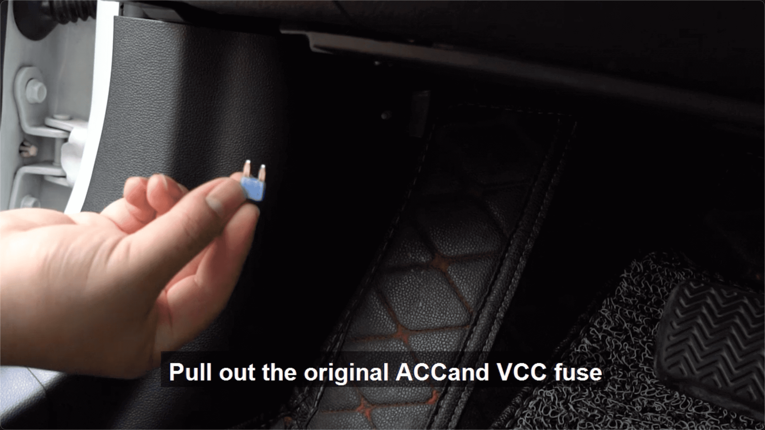Pulling out the original ACC and VCC fuses from the car fuse box.