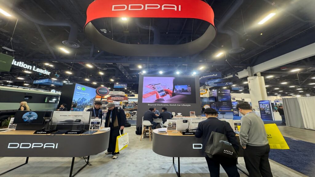 DDPAI exhibition booth at CES 2026 in Las Vegas featuring dashcam product displays