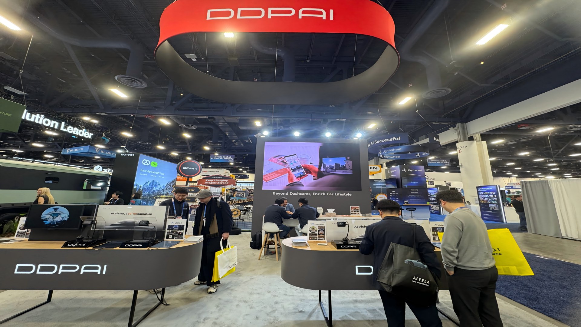 DDPAI exhibition booth at CES 2026 in Las Vegas featuring dashcam product displays